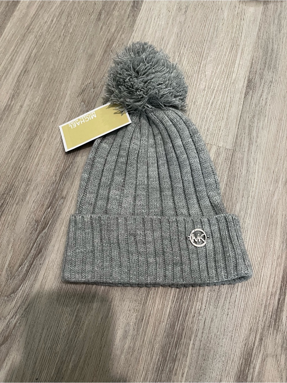 NWT. Michael Kors MK Heather Gray Ribbed Pom Beanie hat with Logo. One size.